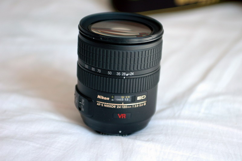 想在蜂鸟买个二手单反镜头,求高手推荐个商家